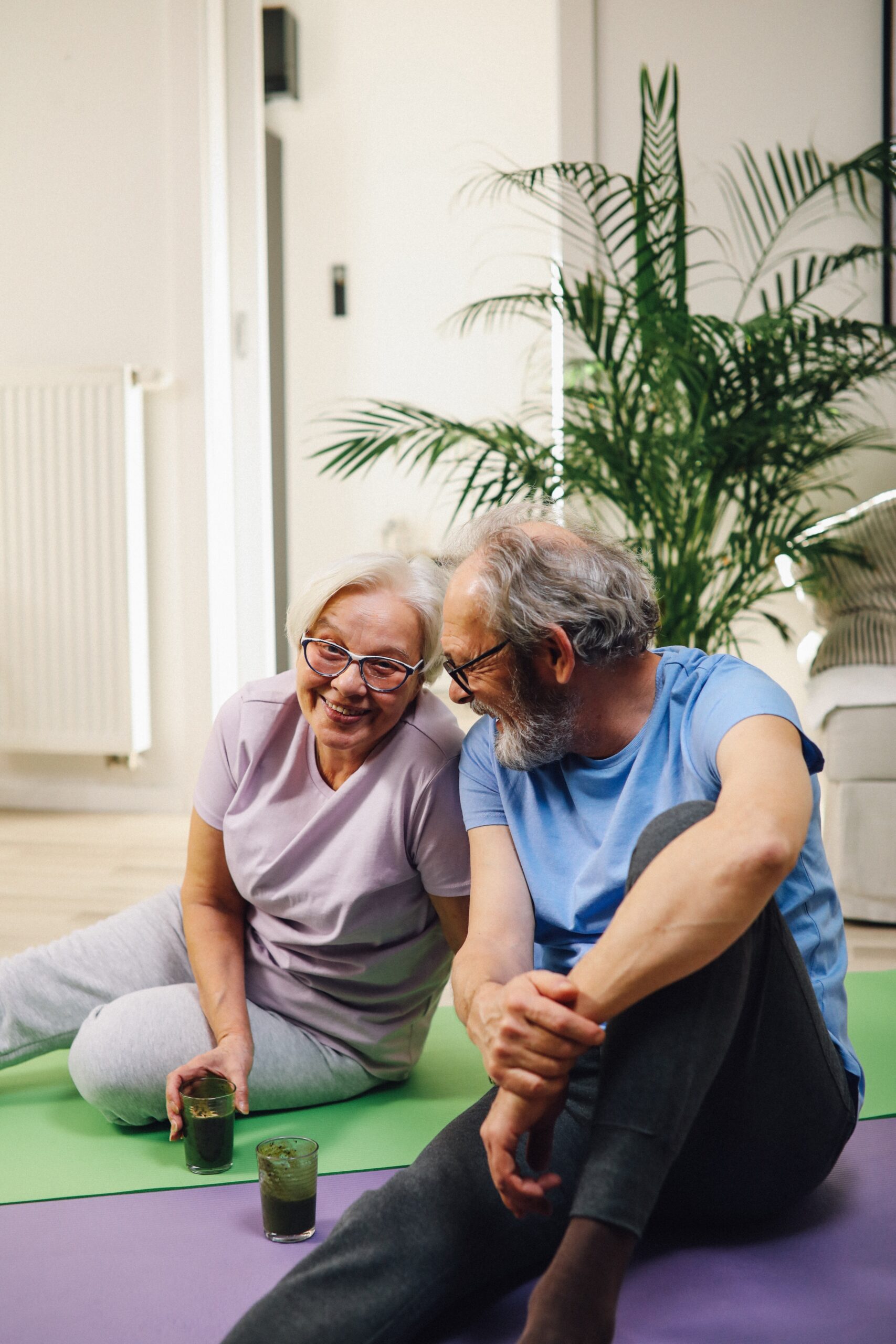 Elderly Couple on Yoga Mats